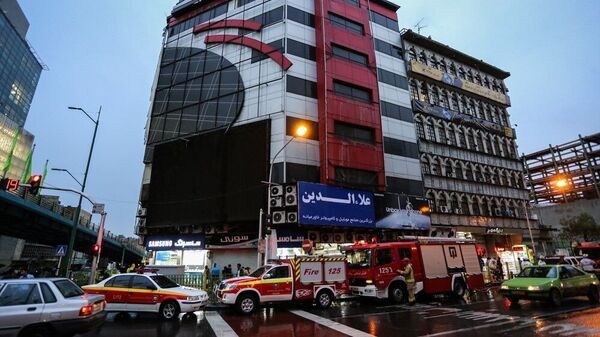 آتش‌سوزی در پاساژ گوشی های موبایل در تهران  - اسپوتنیک ایران  