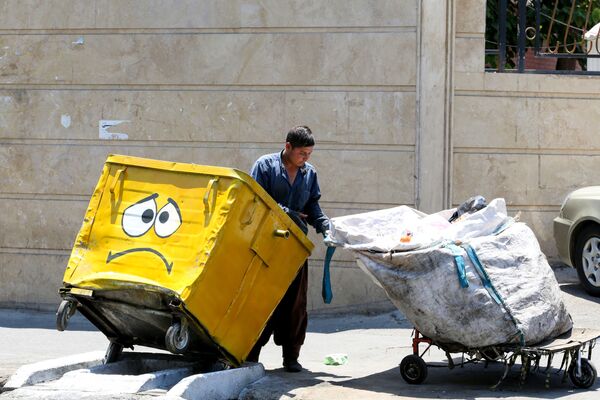 سطل زباله ایرانی شکلک‌دار
کووید و ماسک - اسپوتنیک ایران  