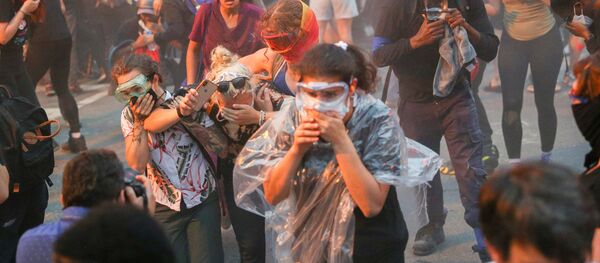 حمله پلیس به خبرنگاران روس در امریکا  - اسپوتنیک ایران  