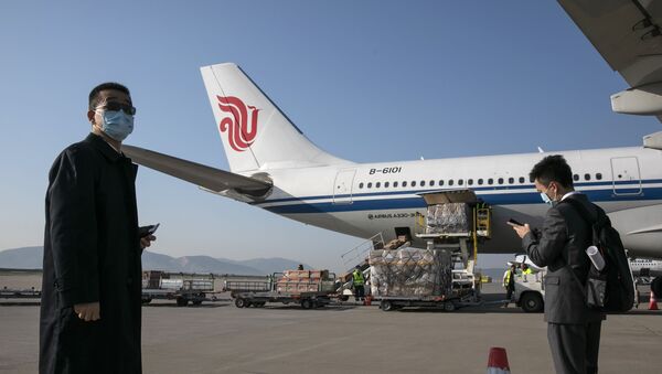 آتش گرفتن هواپیمای باری در فرودگاه شانگهای در چین + ویدئو و عکس  - اسپوتنیک ایران  