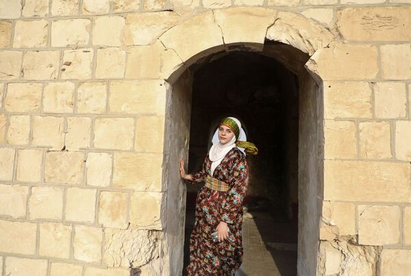 زن فلسطینی در جشن روز لباس سنتی - اسپوتنیک ایران  