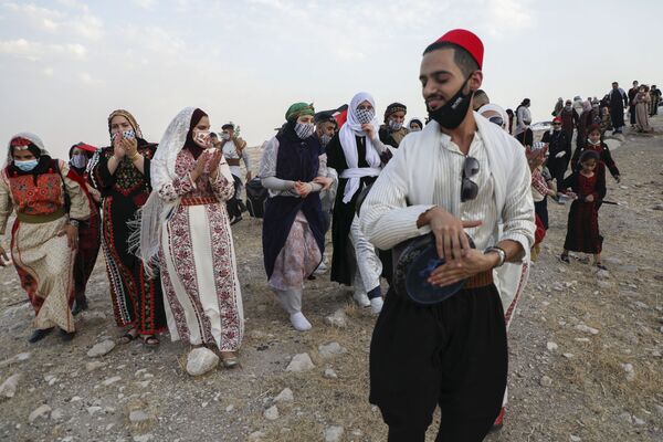 فلسطینی ها در جشن روز لباس سنتی - اسپوتنیک ایران  