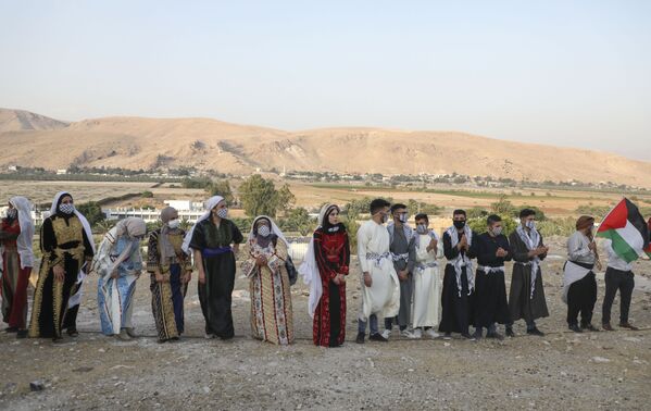 فلسطینی ها در جشن روز لباس سنتی - اسپوتنیک ایران  