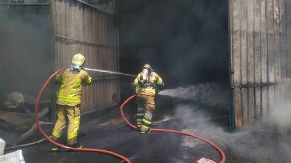 مهار آتش‌ سوزی کارگاه مبل در تهران - اسپوتنیک ایران  