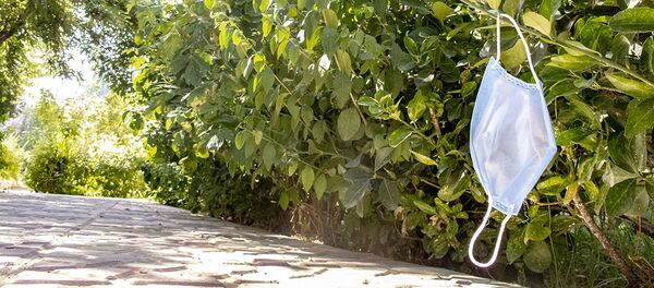 ماسک و دستکش های دور ریخته شده در خیابان های تهران - اسپوتنیک ایران  