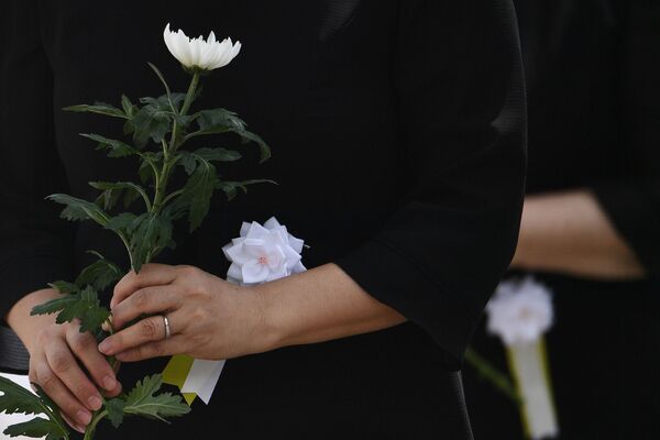 ساکنان شهر در زمان مراسم بزرگداشت در ناکازاکی - اسپوتنیک ایران  