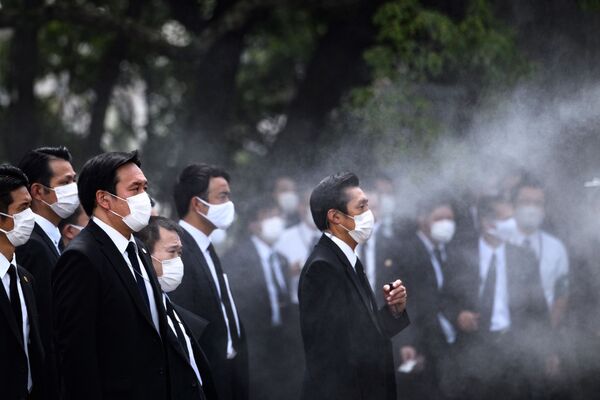 اعضای دولت پن در طول مراسم بزرگداشت یاد قربانیان بمباران اتمی در ناکازاکی - اسپوتنیک ایران  