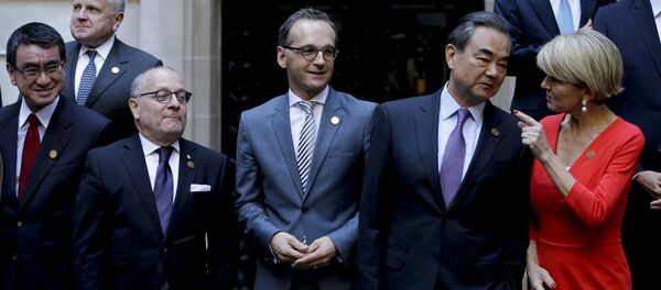 هایکو ماس وزیر امور خارجه آلمان و وانگ یی وزیر امور خارجه چین - اسپوتنیک ایران  