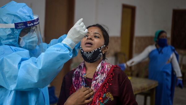 ثبت ۹۳ هزار مبتلای جدید به ویروس کرونا در یک شبانه روز در هند
 - اسپوتنیک ایران  