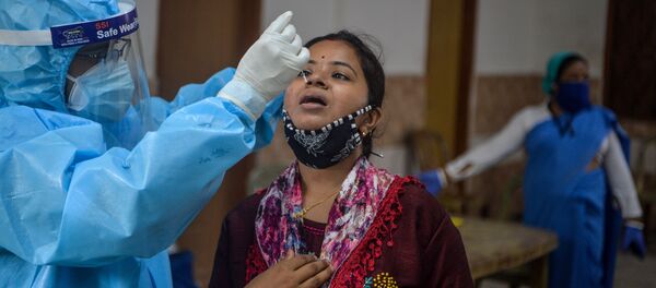 شناسایی تعداد بی سابقه موارد ابتلا به کرونا در هند شناسایی تعداد بی سابقه موارد ابتلا به کرونا در هند - اسپوتنیک ایران