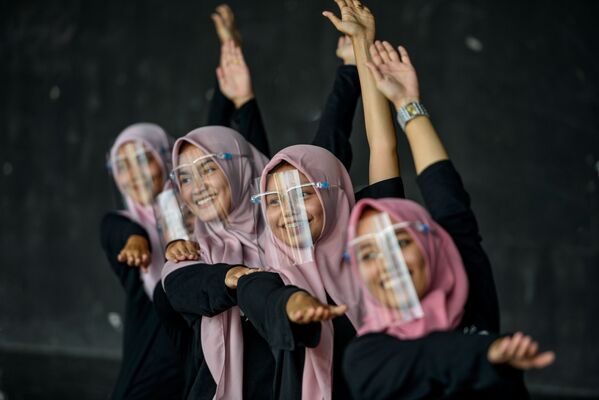 تمرینات ورزشی دختران اندونزی - اسپوتنیک ایران  