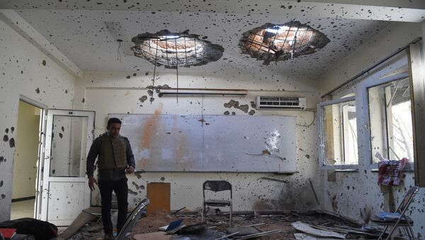 کلاس آسیب دیده در مرکز ملی آماده سازی حقوقی در روز بعد از حمله داعش  - اسپوتنیک ایران  