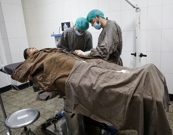 مجروح حمله مسلحانه به دانشگاه کابل - اسپوتنیک ایران  