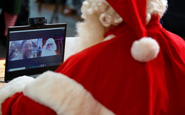امسال کودکان از حضور نزدیک در کنار بابانوئل محروم می شوند - اسپوتنیک ایران  