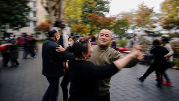 Люди танцуют в Ухане почти год после начала пандемии  - اسپوتنیک ایران  