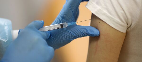 Вакцинация от коронавируса пациента в городской поликлинике № 2 в Волгограде Вакцинация от коронавируса пациента в городской поликлинике № 2 в Волгограде - اسپوتنیک ایران