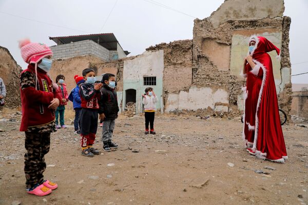 معجزه کریسمس در زمینه ویرانه‌های موصل - اسپوتنیک ایران  
