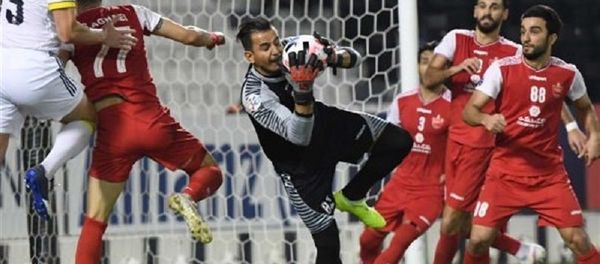 دروازهبان پرسپولیس ایران بر بام آسیا ایستاد دروازهبان پرسپولیس ایران بر بام آسیا ایستاد - اسپوتنیک ایران