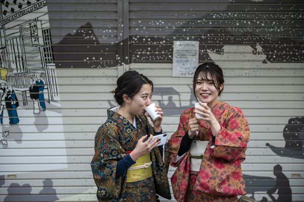 رویدادهای هفته به روایت تصویر
دختران کیمونوپوش ژاپنی - اسپوتنیک ایران  