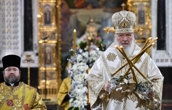 اسقف اعظم مسکو و کل روسیه در مراسم کریسمس در کلیسای مسیح منجی در مسکو - اسپوتنیک ایران  
