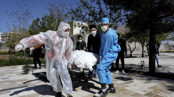 تصاویر هولناک از اجساد کرونایی در بیمارستان قائم مشهد + ویدئو - اسپوتنیک ایران  