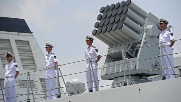 گارد ساحلی چین اجازه گشودن آتش به روی کشتی‌های خارجی را دریافت کرد - اسپوتنیک ایران  