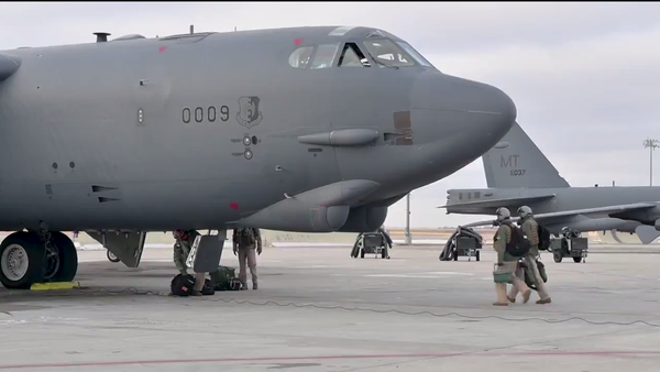 A screenshot of a video showing B-52 bomber being prepared for the flight at the military base in North Dakota, US  - اسپوتنیک ایران  
