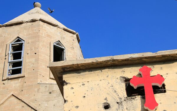 تهیه مقدمات نخستین سفر پاپ به عراق
کلیسا در شهر قدیمی موصل - اسپوتنیک ایران  