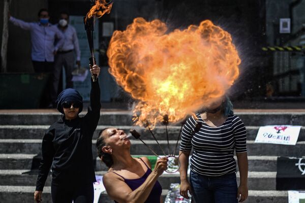 اعتراض به خشونت علیه زنان در مکزیکو سیتی - اسپوتنیک ایران  