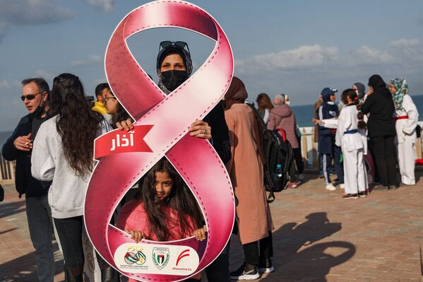 زنان فلسطینی در راهپیمایی به مناسبت روز جهانی زن در غزه - اسپوتنیک ایران  
