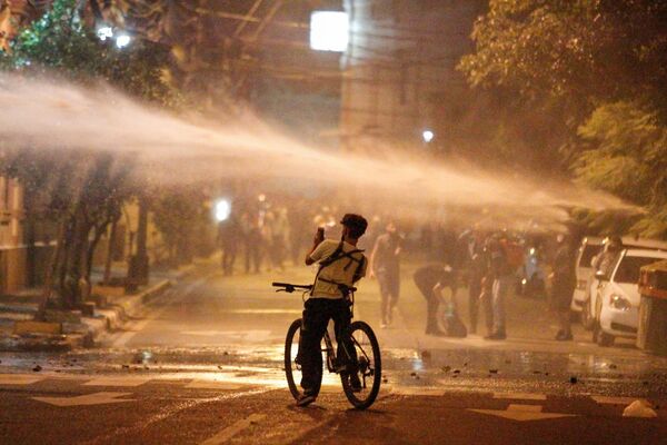 رویدادهای هفته به روایت تصویر
تظاهرات در پاراگوئه - اسپوتنیک ایران  