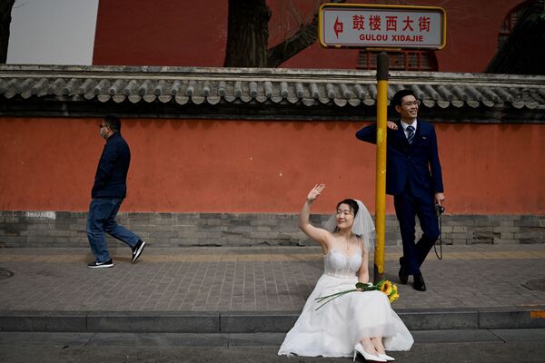 رویدادهای هفته به روایت تصویر
عکاسی عروسی در پکن - اسپوتنیک ایران  