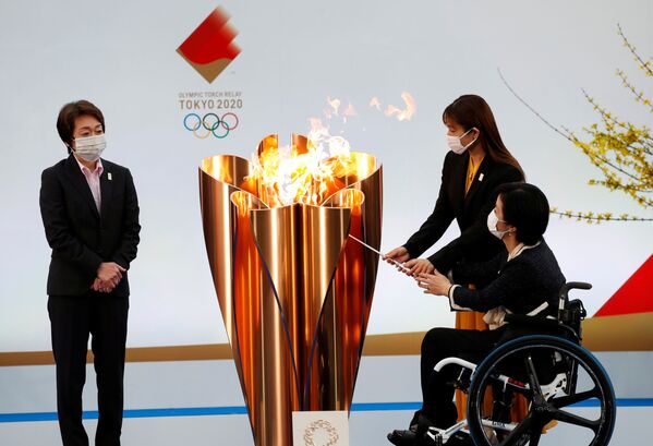 مراسم ۱۲۱ روزه انتقال مشعل المپیک توکیو  - اسپوتنیک ایران  