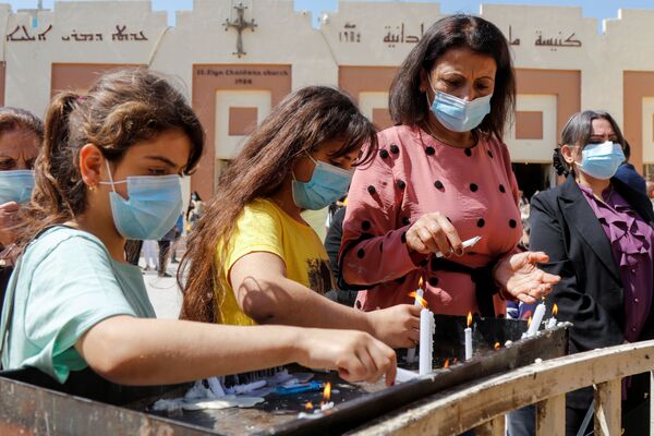 کاتولیک ها عید پاک را برگزار کردند
بغداد - اسپوتنیک ایران  