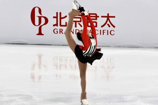 ورزشکار چینی در مسابقات آزمایشی المپیک زمستانی 2022 در پکن - اسپوتنیک ایران  