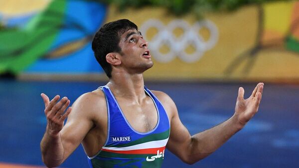 حسن یزدانی انتقام المپیک را از تیلور گرفت - اسپوتنیک ایران  
