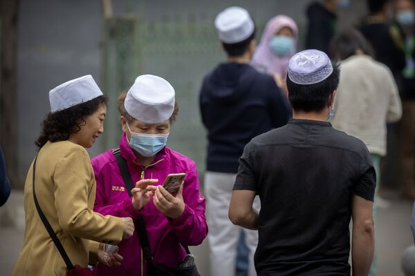 مسلمانان پیش از شروع نماز عید فطر در پکن - اسپوتنیک ایران  