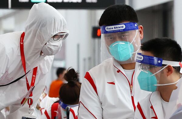 استقبال از ورزشکاران المپیک با تست و ماسک - اسپوتنیک ایران  