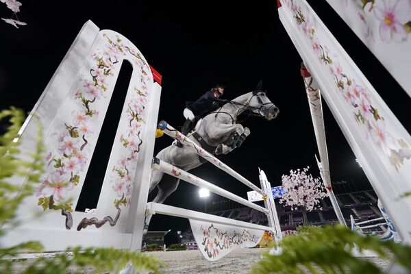 رویدادهای هفته به روایت تصویر
مسابقه اسب سواری در المپیک ژاپن - اسپوتنیک ایران  