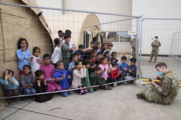 رویدادهای هفته به روایت تصویر
نظامی آمریکایی، بچه های افغانی، آلمان - اسپوتنیک ایران  