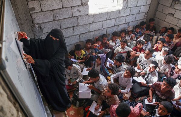 رویدادهای هفته به روایت تصویر
کلاس درس در یمن - اسپوتنیک ایران  