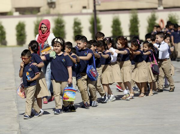 لباس مدرسه دانش آموزان در عراق - اسپوتنیک ایران  