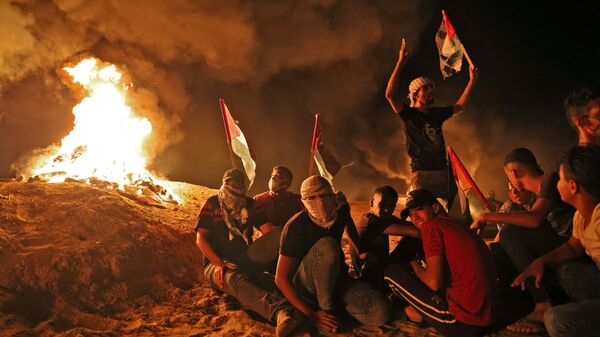 یک کشته و ۱۵ زخمی در ششمین شب تظاهرات فلسطینیان در نوار غزه - اسپوتنیک ایران  