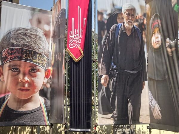 با فرارسیدن اربعین در ایران، نمایشگاه عکس خیابانی برگزار شد - اسپوتنیک ایران  