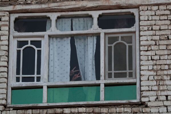 نشان پیروزی از پنجره ای در کابل - اسپوتنیک ایران  