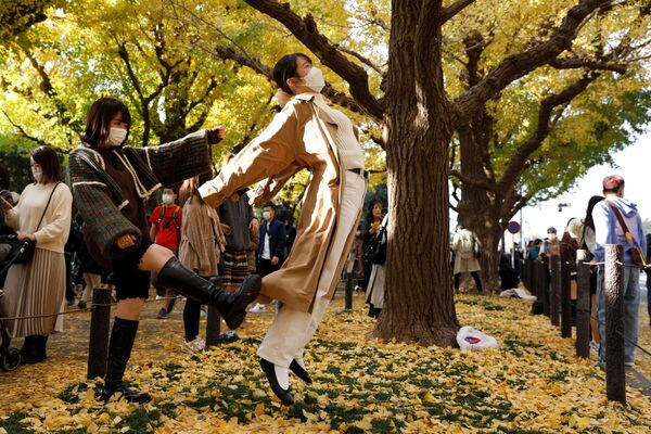 رویدادهای هفته به روایت تصویر.عکاسی در ژاپن و ژست مضحک. - اسپوتنیک ایران  