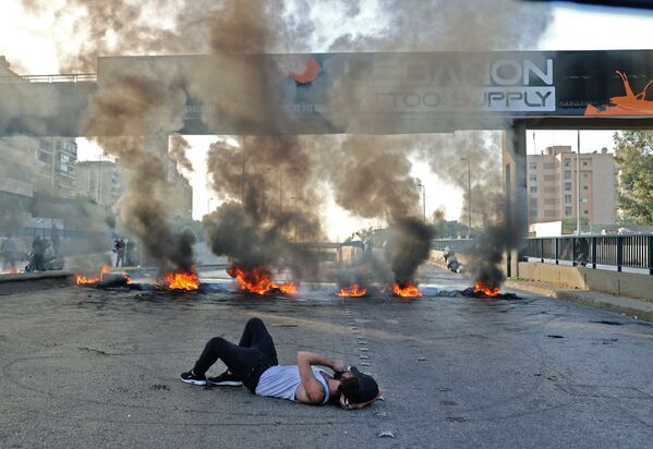 جالب ترین رویدادهای هفته به روایت تصویر.اعتراضات در لبنان. - اسپوتنیک ایران  
