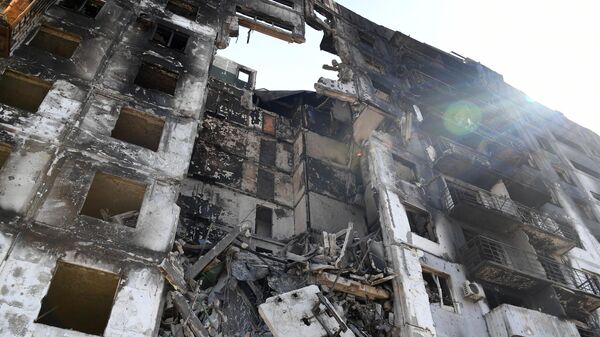 Разрушенный дом в Мариуполе в результате обстрела  - اسپوتنیک ایران  