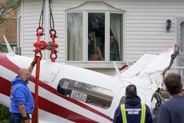 رویدادهای هفته به روایت تصویر.سقوط هواپیما در نزدیک خانه مسکونی در نیوجرسی. - اسپوتنیک ایران  