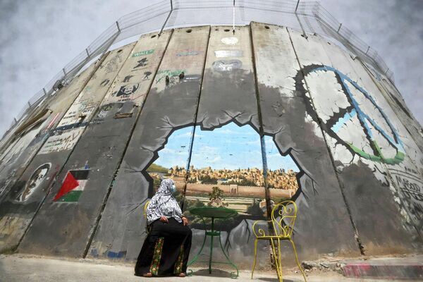 رویدادهای هفته به روایت تصویر.دیوار مرزی فلسطین و اسرائیل. - اسپوتنیک ایران  